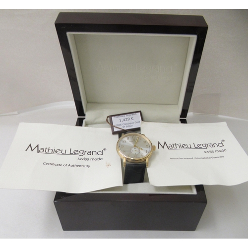 160 - A Mathieu Legrand Swiss made gold plated stainless steel cased wristwatch, faced by an Arabic dial w... 