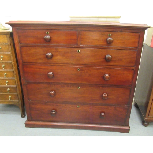 207 - A mid Victorian mahogany dressing chest, comprising two short/four graduated long drawers with bun h... 