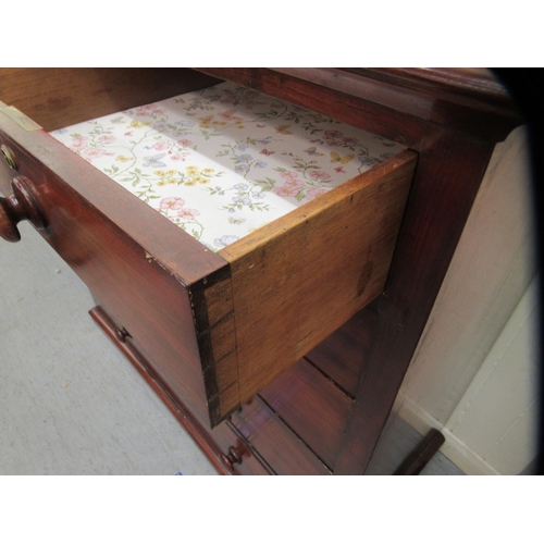 207 - A mid Victorian mahogany dressing chest, comprising two short/four graduated long drawers with bun h... 