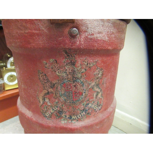 35 - A red canvas clad ammunition carrier and cover, decorated with a crest  21.5