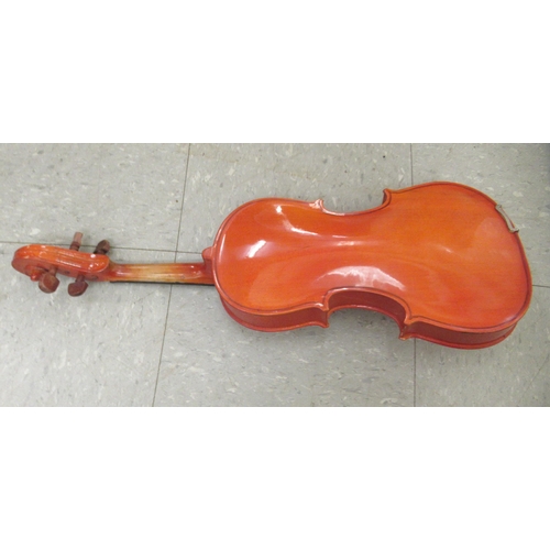 63 - A Stentor Music Company violin, the two piece back 13.5