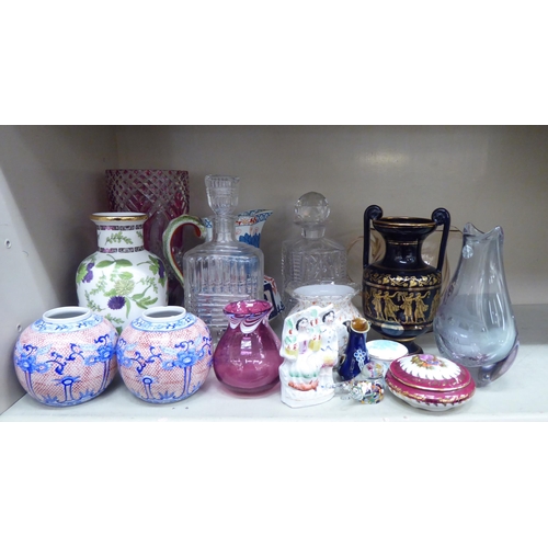 127 - Decorative ceramics and glassware: to include a clear and cranberry coloured vase  10.5