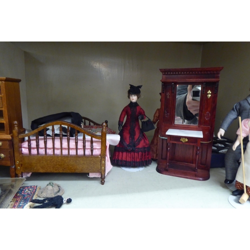 135 - Dolls house furniture and accessories: to include a wooden double bed