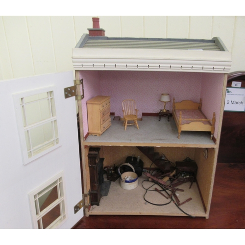 163 - A scratch built dolls house, containing various furniture  23