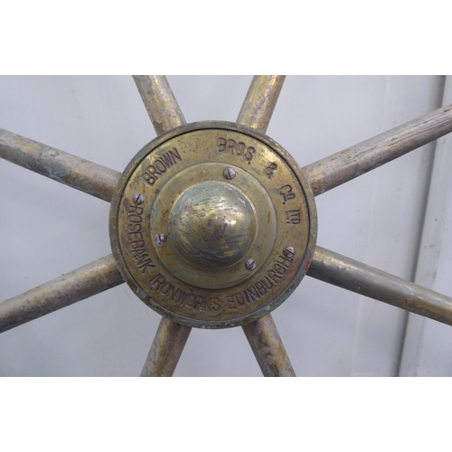 16 - A 20thC brass ships wheel with turned wooden handles  bears impressed marks 'Brown Brothers, Roseban... 