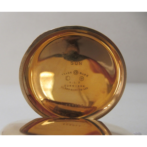 185 - A Limit gold plated cased half hunter pocket watch, faced by an Arabic dial with subsidiary seconds