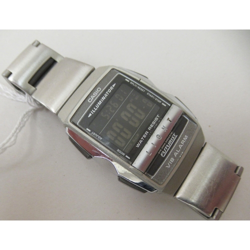 193 - A Casio Futurist stainless steel cased bracelet watch, faced by a digital dial