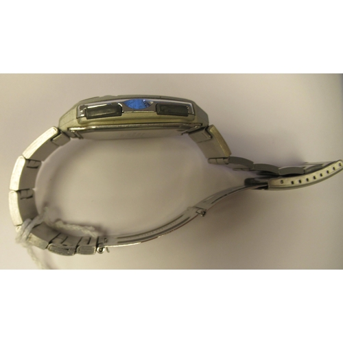 193 - A Casio Futurist stainless steel cased bracelet watch, faced by a digital dial