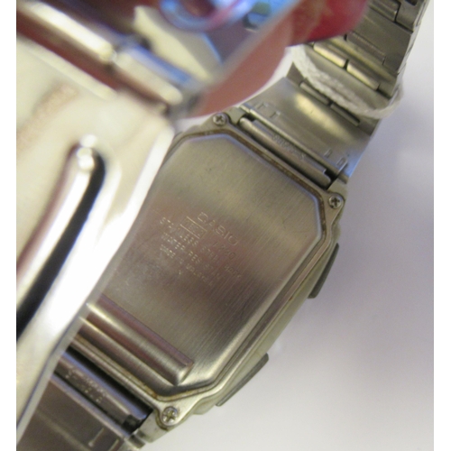 193 - A Casio Futurist stainless steel cased bracelet watch, faced by a digital dial