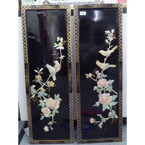 198 - A pair of modern, black lacquered chinoiserie panels, decorated with resin floral and birds  ea... 