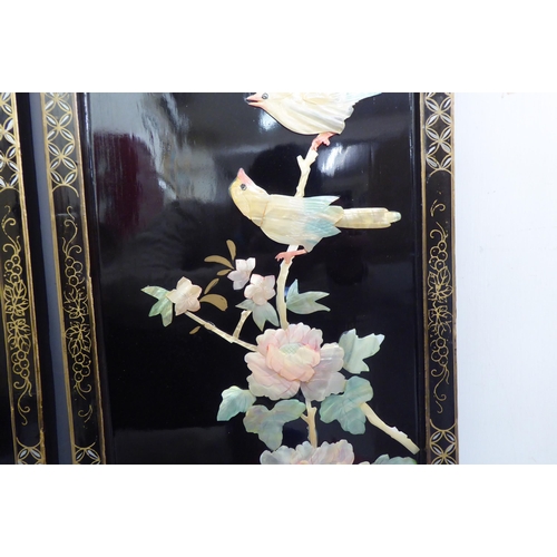 198 - A pair of modern, black lacquered chinoiserie panels, decorated with resin floral and birds  ea... 