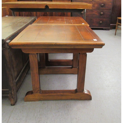 199 - A pair of early 20thC style mahogany side tables with planked tops, raised on square section legs an... 