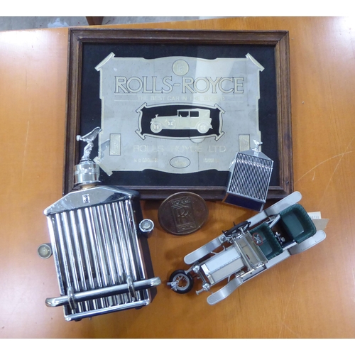 2 - Rolls Royce related collectables: to include a chromium plated table lighter, fashioned as a radiato... 