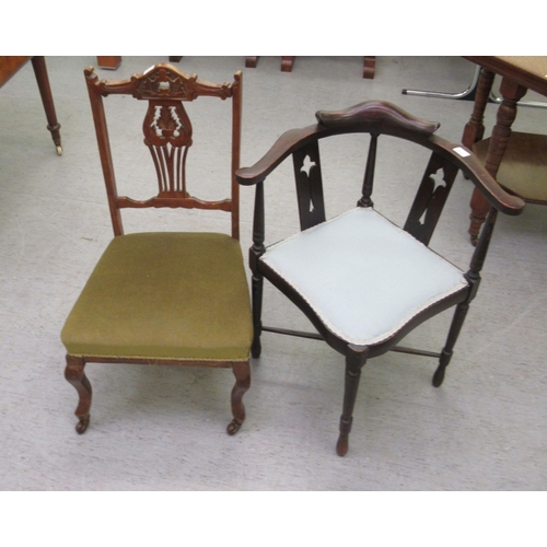 211 - An Edwardian mahogany framed and upholstered nursing chair; and a 1920s stained beech corner chair