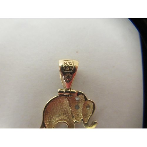 226 - A 14ct gold pendant, fashioned as an elephant