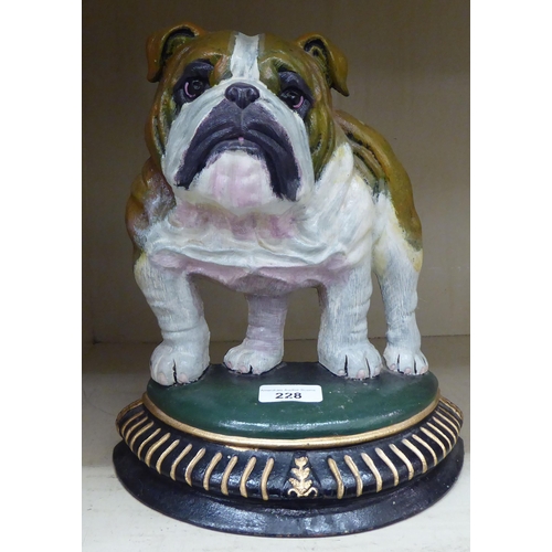 228 - A modern painted cast iron door porter, fashioned as a British bull dog, on a bow front plinth ... 