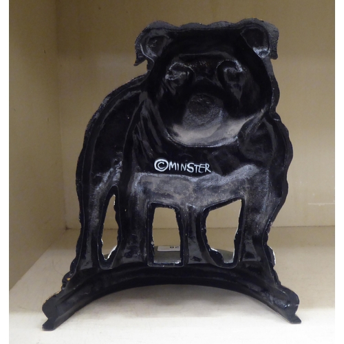 228 - A modern painted cast iron door porter, fashioned as a British bull dog, on a bow front plinth ... 