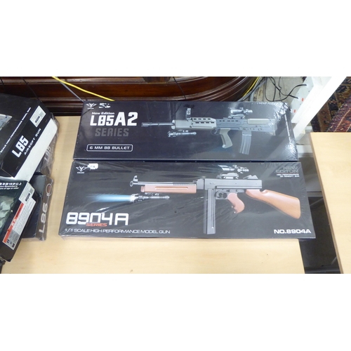 238 - Eight Airsoft guns: to include an L85 A2  boxed