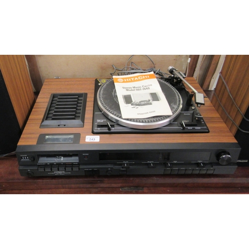 243 - An Hitachi stereo music centre, model no. SDT 7640; and a pair of teak effect cased speakers, model ... 