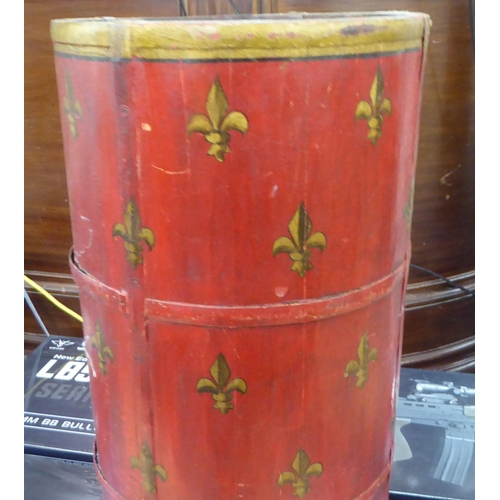 252 - An early/mid red painted and rivetted metal bound stickstand of cylindrical form  20