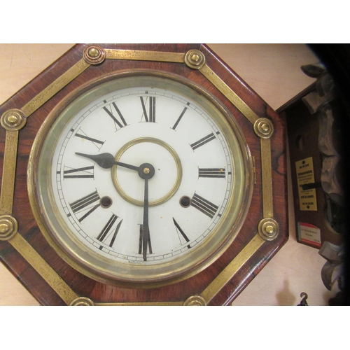 267 - Two clocks: to include a modern Black Forest inspired carved and stained beech framed cuckoo clock  ... 