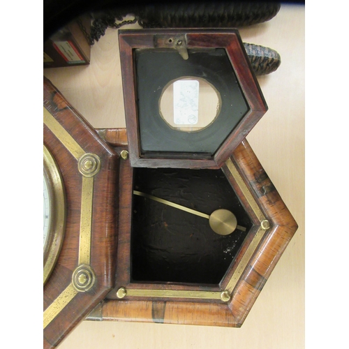 267 - Two clocks: to include a modern Black Forest inspired carved and stained beech framed cuckoo clock  ... 