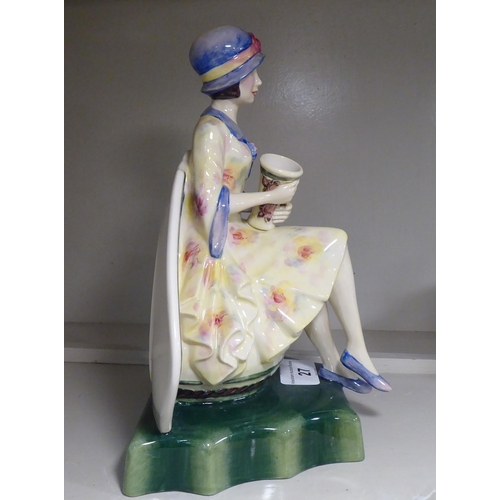 27 - A Kevin Francis china figure 'Charlotte Rhead'  Limited Edition 7/950  8.75