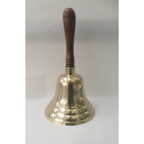 281 - A modern replica of an early 20thC brass school bell, on a turned wooden handle