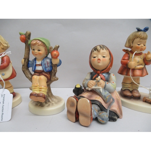 299 - Six Goebel china figures: to include a girl feeding a dog  4