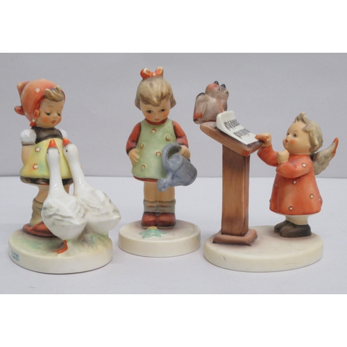 302 - Nine Goebel china figures: to include a girl reading a book  4