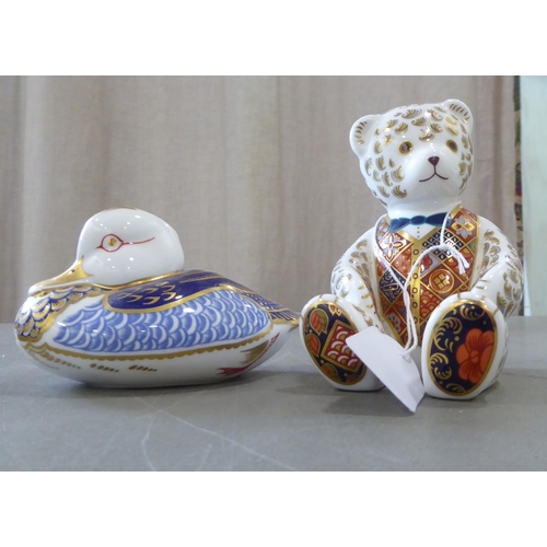 305 - Four Royal Crown Derby china paperweights, each with gilt stoppers: to include a seated Teddy bear&n... 