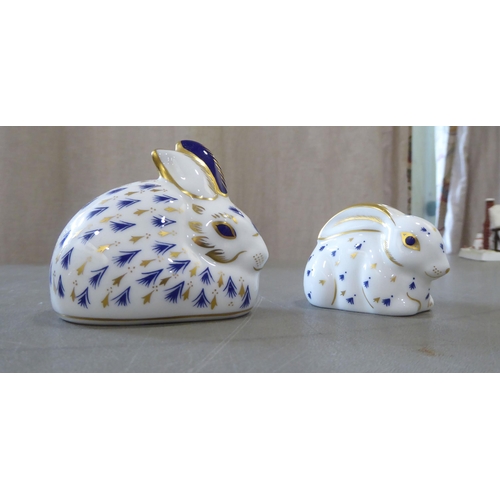 308 - Royal Crown Derby china paperweights and ornaments: to include two rabbits with gilt stoppers  ... 