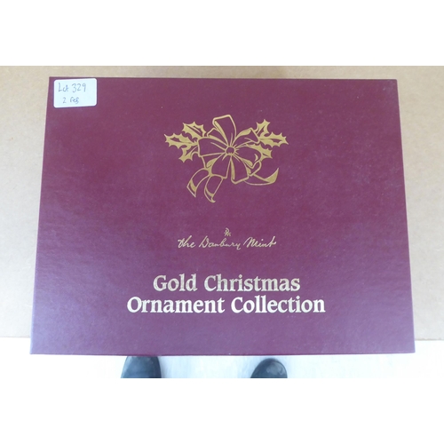 329 - The Danbury Mint gold coloured Christmas decorations  boxed