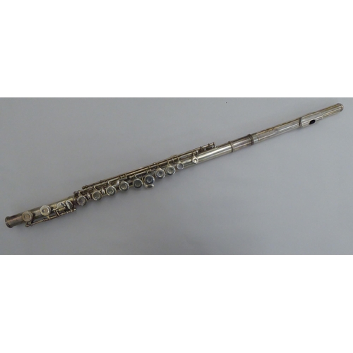 33 - A Grassi of Milan silver plated flute  cased