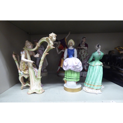 35 - Continental porcelain figures: to include a woman playing the harp  8