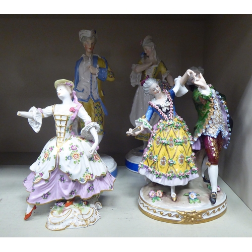 44 - Early 20thC Continental porcelain figures: to include a man and a woman, dancing  10