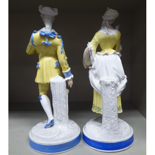 44 - Early 20thC Continental porcelain figures: to include a man and a woman, dancing  10