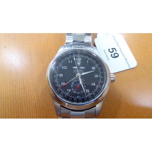 59 - A stainless steel cased and strapped wristwatch 