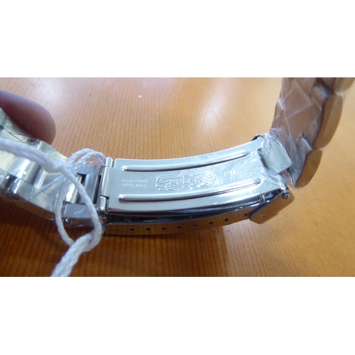 59 - A stainless steel cased and strapped wristwatch 