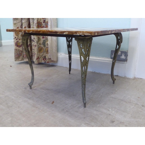 64 - A modern cast metal coffee table frame, the drop-in onyx and marble table top set with a chessboard ... 