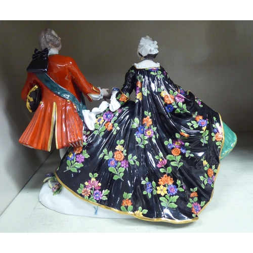 75 - A Continental porcelain group, a couple wearing evening dress  9