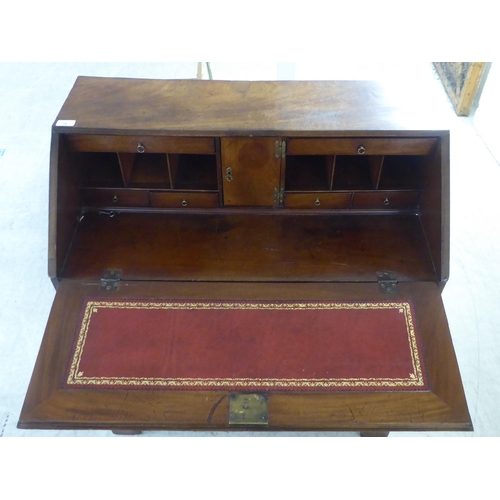 76 - A 19thC ladies mahogany bureau with a fall flap, over four graduated drawers, raised on bracket feet... 