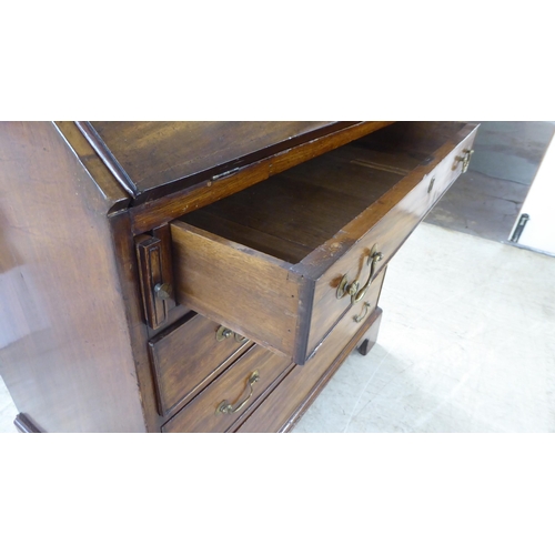 76 - A 19thC ladies mahogany bureau with a fall flap, over four graduated drawers, raised on bracket feet... 