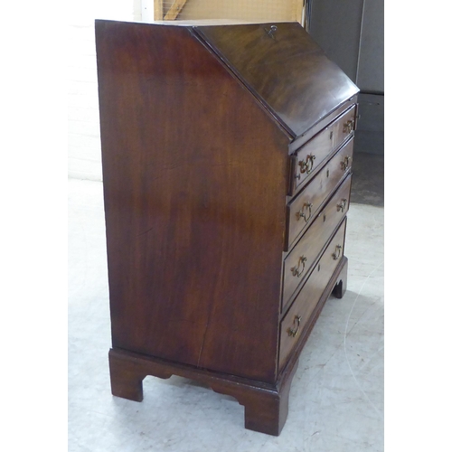 76 - A 19thC ladies mahogany bureau with a fall flap, over four graduated drawers, raised on bracket feet... 