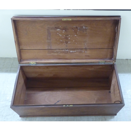 79 - A late 19thC mahogany box with straight sides and a hinged lid, on a plinth  15