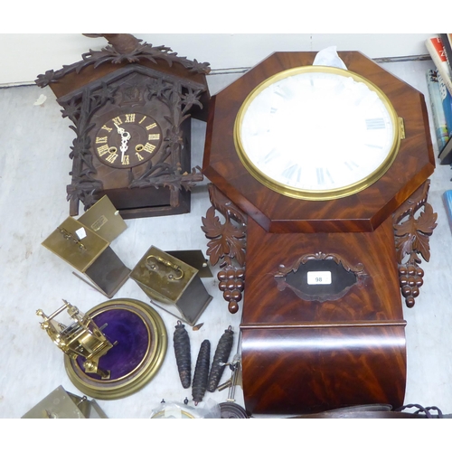 98 - A mixed lot: to include a 20thC Black Forest inspired, carved, stained beech cased cuckoo clock  14