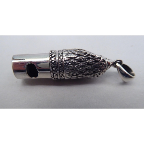 54 - A silver whistle, fashioned as a bird of prey, on a pendant ring&nbsp; stamped 925