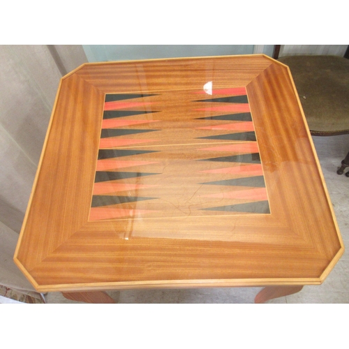 56 - A modern laminated teak effect combination games table, raised on square, tapered, cabriole legs&nbs... 