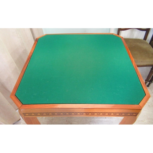 56 - A modern laminated teak effect combination games table, raised on square, tapered, cabriole legs&nbs... 