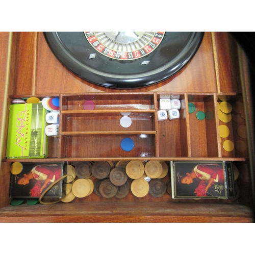 56 - A modern laminated teak effect combination games table, raised on square, tapered, cabriole legs&nbs... 